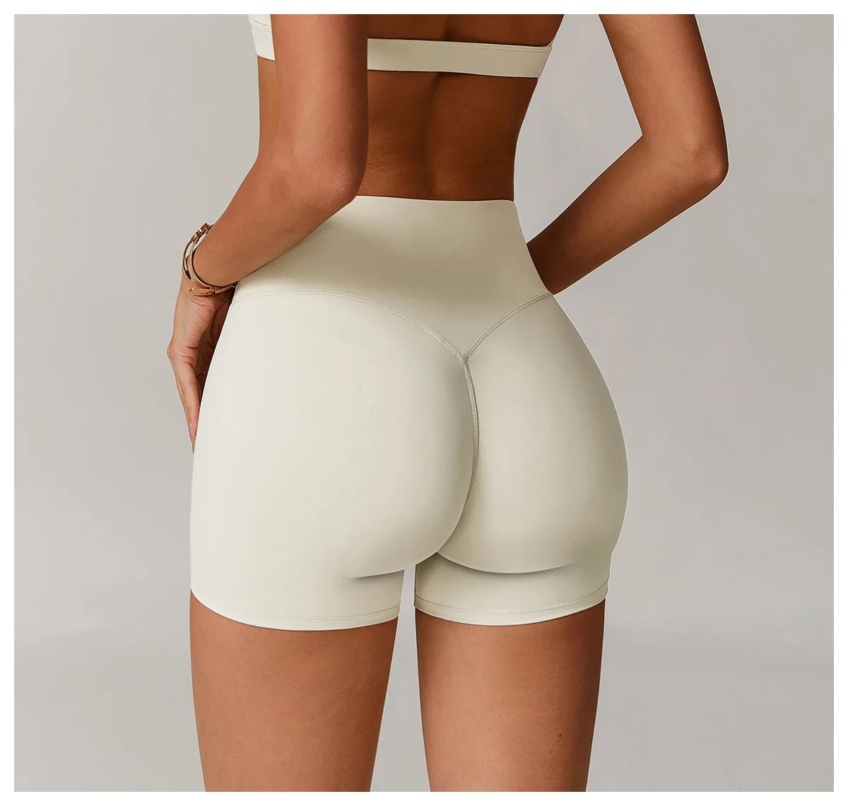 High waisted and hip lifting yoga shorts for women wearing tight fitting and slimming running sports shorts