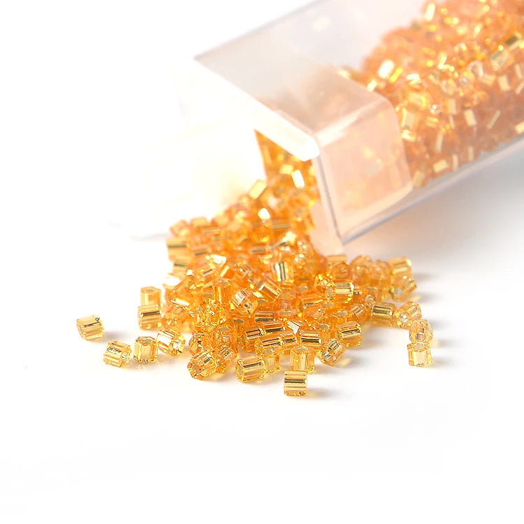 Wholesale Cheaper 10 Grams Transparent Gold 2mm Toho Seed Beads for Crafts Making