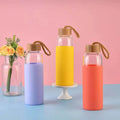New Design Unbreakable Glass Water Bottle With Soft Customized Sleeve Silicone Seal With Bamboo Lids for Water Milk Fruit