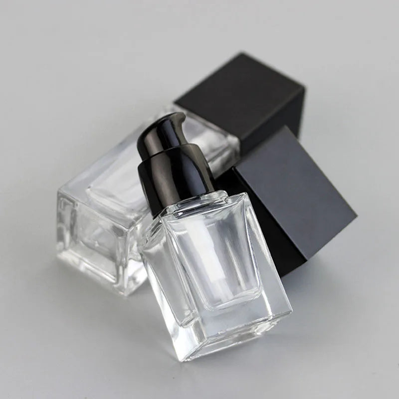 Low MOQ Empty 30ml clear square Glass Cosmetic Black Press Pump Liquid Foundation Bottle