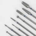 Low MOQ Professional Manicure Nail Art Metal Tool Diamond Nail Drill Bit Nail Drill Salon Polishing 0.006 1*1*7 50pcs C.M.F CE