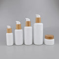 Cosmetic Opal Glass Bottle 40 ml 100 ml 120 ml 200 ml White Glass Bottle Serum Pump Bottle and 50 ml Glass Jar with Bamboo Lid