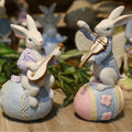 Christmas Resin Rabbit Playing Violin and Lute Sitting Egg 3D Sculpture Handmade Lifelike Garden Decoration