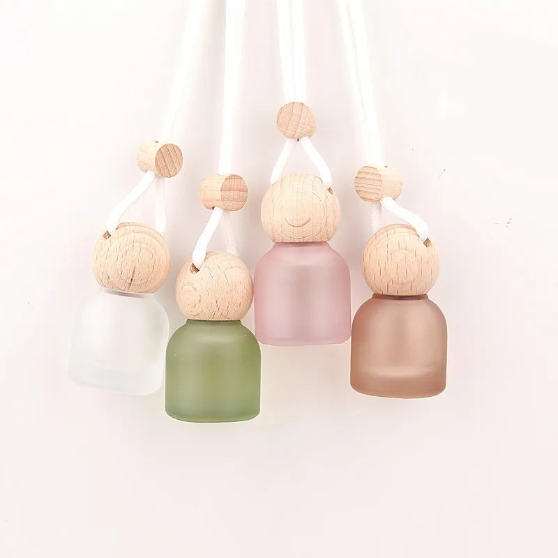 Wholesale 10ml air Freshener Diffuser Empty Frosted color Car Hanging Perfume Bottle with Wooden Cap