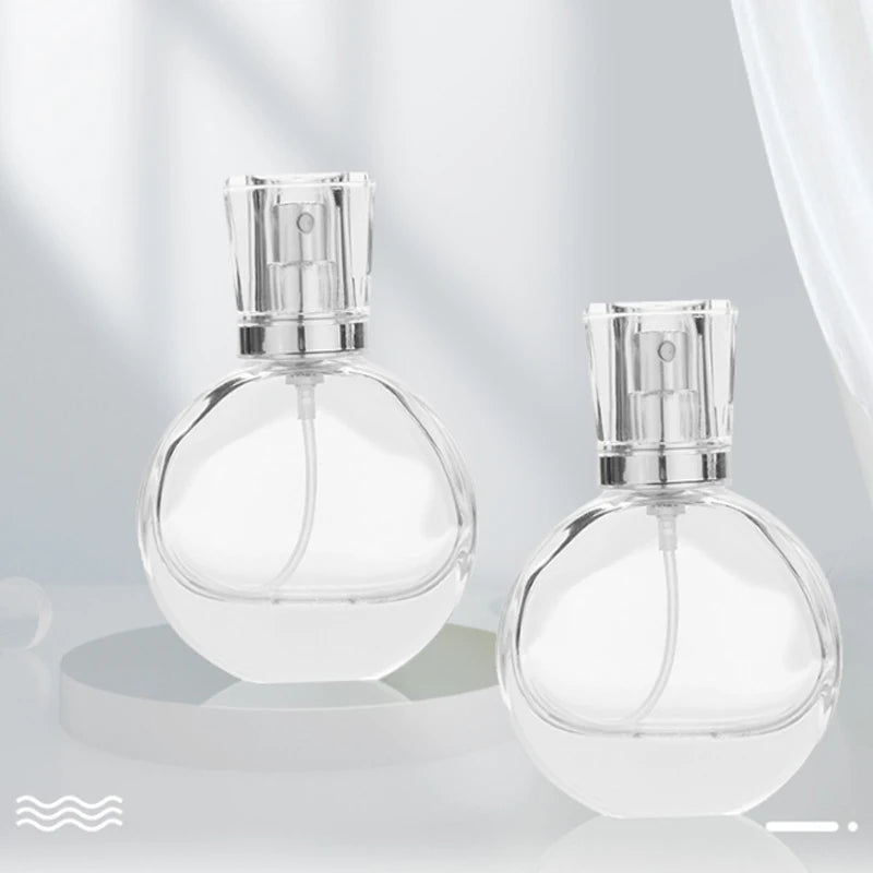 China Manufacturer 25ml Custom Fancy Luxury Glass Perfume Bottles Round with Screw Cap and Screen Printing