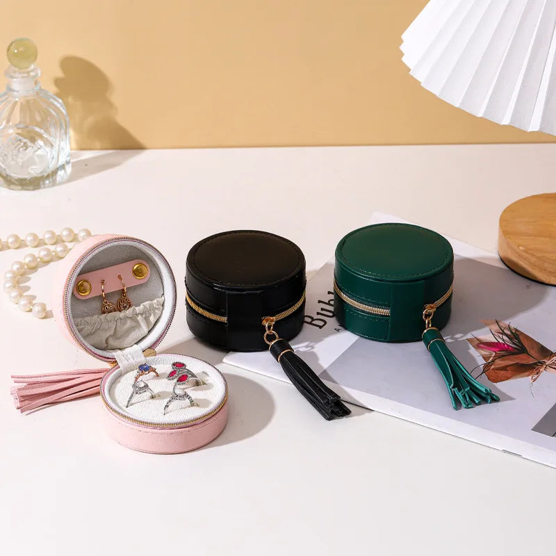 Luxurious Modern Mini Round PU Leather Portable Zipper Closure Travel Jewelry Box with Tassel