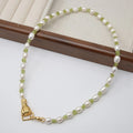 Luxury Golden Hand-held natural pearl Green Broken Crystal Necklace with a Hollow square Frame