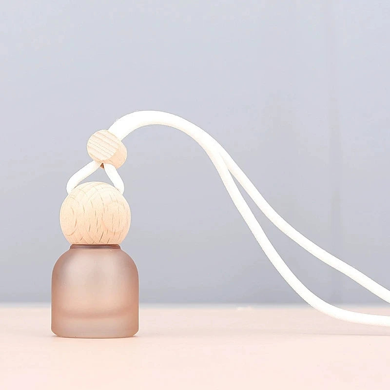Wholesale Refillable Round Shape Pendant 10ml Aroma Diffuser Car Hanging Perfume Bottle Custom LOGO