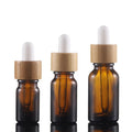 5ml 10ml 15ml 20ml 30ml 50ml Round Bamboo Amber Glass Essential Oil Dropper Bottles with Screen Printing