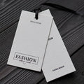Custom Logo Gold Foil Premium Embossed Kraft Paper Printed Luxury Brand Label OEM Wholesale Garment Clothing Swing Hang Tags