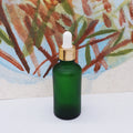 Frosted Green Essential Oil Glass Bottle 50ml with Gold Dropper Lid