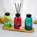 100ml 150ml Round Light Blue Red Color Essential Oil Diffusion Bottle Aromatherapy Diffuser Container with Wooden Lid