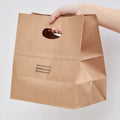 Wholesale Brown Kraft Paper Die Cut Handle Bag Paper Food Packaging for Fast Food Bread Cookie Take Away Food Packaging Bag