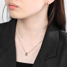 2024 Simple and Chubby Water Drop Hollow Set Smooth Water Drop Hollow Stainless Steel Earrings Necklace