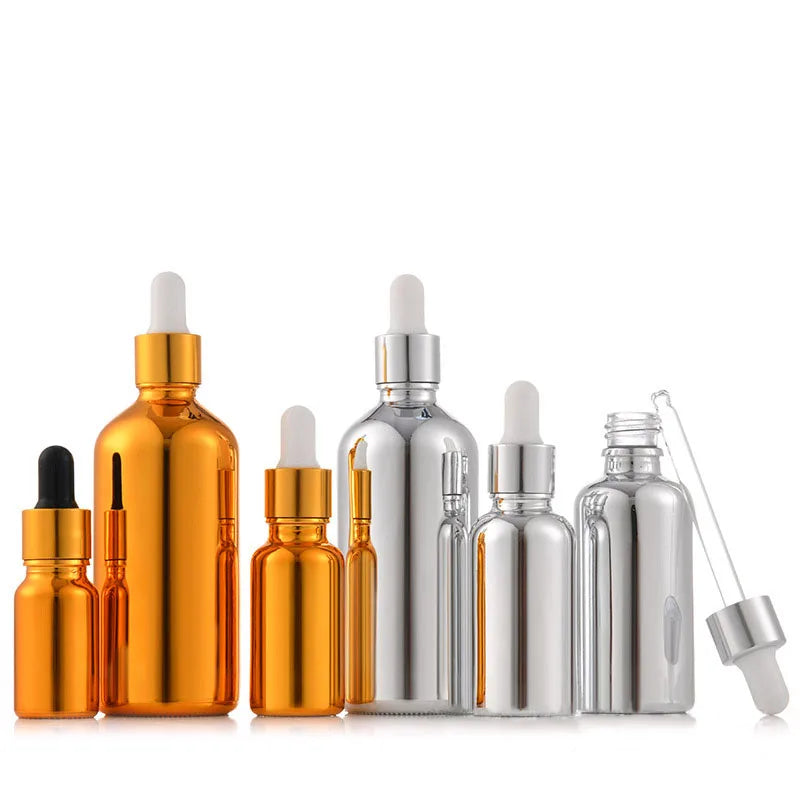 Wholesale 5ml 10ml 15ml 20ml 30ml 50ml 100ml Gold/Silver UV Colored Glass Bottle Dropper Essential Oil Bottle