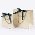 Custom Marble Print Packaging Bags for Small Businesses Shopping Bags with Bow Tie Ribbon Handle Luxury Shopping Bag