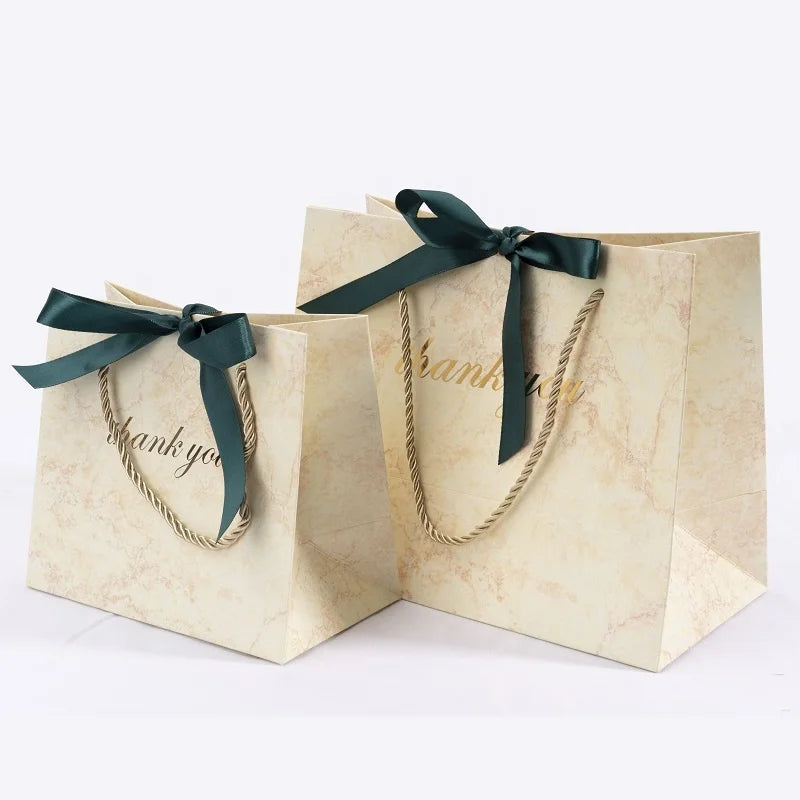 Custom Marble Print Packaging Bags for Small Businesses Shopping Bags with Bow Tie Ribbon Handle Luxury Shopping Bag