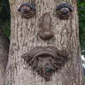 Tree-face Modern Resin Statue Hand-painted Holiday Decoration Ornament for Garden Landscaping with Fun Shapes