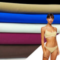 Lightweight Soft 90 Nylon 10 Spandex Knitted Plain Dyed Seamless Interlock Double Jersey 2*2 Rib Fabric for Underwear