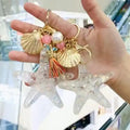 Keyring De Estrella New Starfish Keychain Resin Lovers Seashells Metal Car Key Ring Pendants Bag Chain Liquid Star Keychain