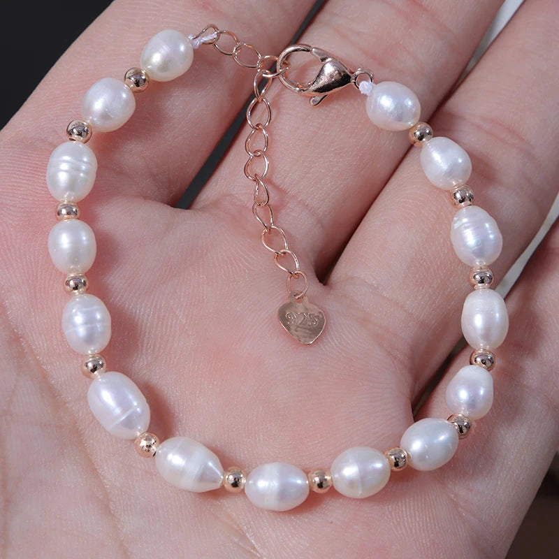 New Arrival 18K Gold Plated Freshwater Pearl Bracelet with Heart S925 Pendant Elastic Rice Bead Bracelets for Women for Weddings