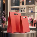 Luxury Die Cut Handles Design Shopping Cosmetic Packaging Perfume Custom Printed Lotion Lipstick Wigs Paper Bag