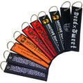 Hot Sale Cheap Anime Design Key Tag Woven Motorcycle Flight Label Jet Tag Fabric Woven Brand Embroidered Keychain