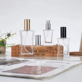 Wholesale Empty 30ml  50ml 100 ml Screw Neck Clear  Slim Refillable Perfume Spray Glass Bottle