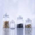 Wholesale clear Home 650 ml Food Grade Masala Packaging Glass Jar with Glass Lids