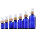 In Stock5ml 10ml 15ml 20ml 30ml 50ml 100ml Frosted/amber/blue/green Glass Essential Oil Spray Bottle With Real Bamboo Spray Top