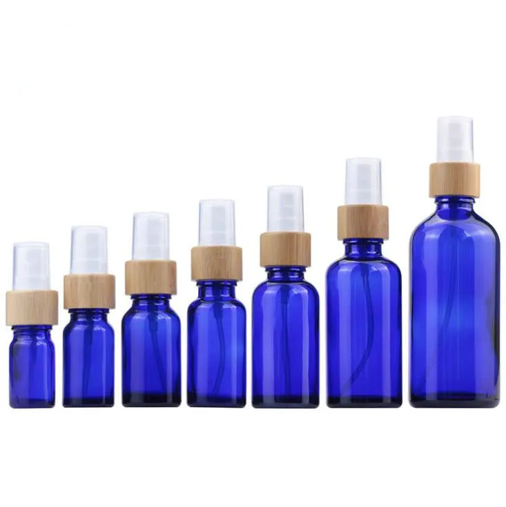 In Stock5ml 10ml 15ml 20ml 30ml 50ml 100ml Frosted/amber/blue/green Glass Essential Oil Spray Bottle With Real Bamboo Spray Top