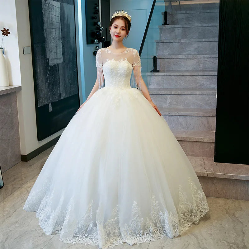 2022 Heavy Small Sequins Beading Top Ivory Wedding Dress With Sleeve Tassel Tulle Wedding Gown O Neck Bride Dresses