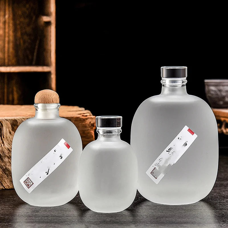 Clear Frosted 100ml 250ml 500ml Glass Bottles with Cork Stopper for Juice Drinks and Beverages