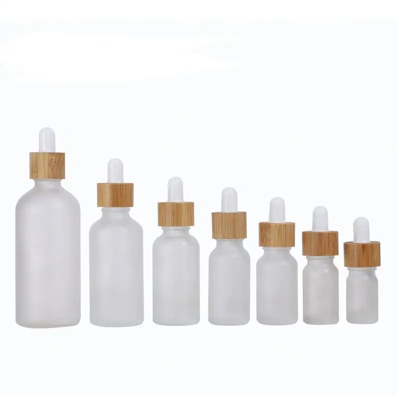 Custom Empty Frosted Glass Dropper Bottle With Bamboo Lid 10ml 20ml 30ml 50ml Refillable Essential Oils Serum Dropper Bottles