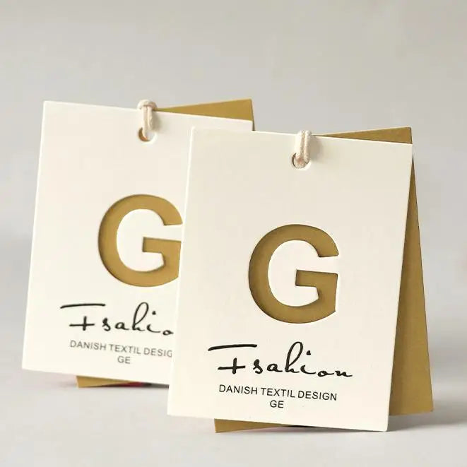 FSC Luxury Customized Hollow Out Paper Apparel Garment Swing Hangtags Clothing Hang Tag for Clothing Garment Tags