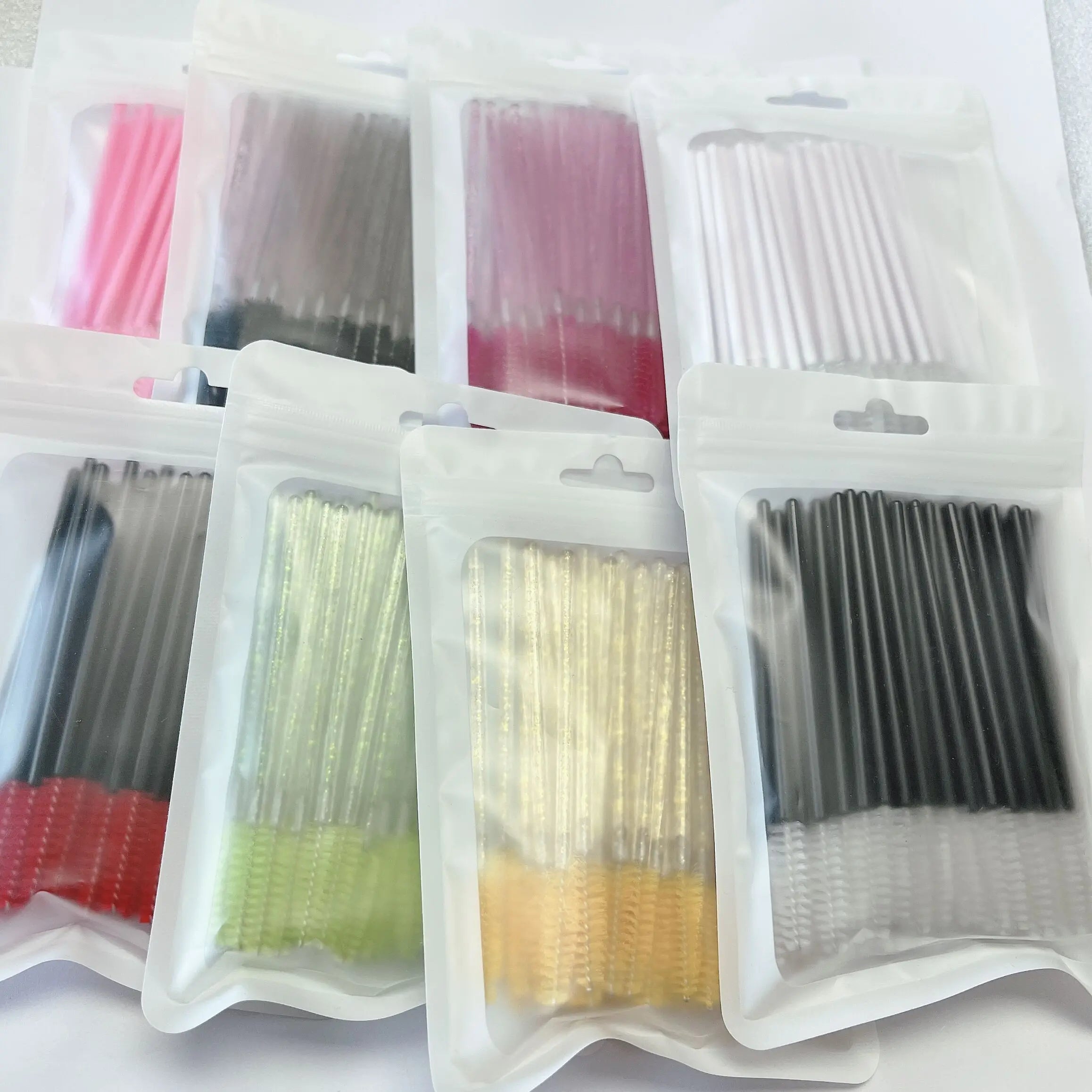 Wholesale Color Disposable 50 Pcs/Bag Lash Crystal Glitter Nylon Spoolie Brush for Salon Lash Cleanser Mascara Makeup Brush Tool