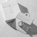 Small Minimum Order Quantities China Cheap Customize Luxury Rings Display Packaging Luxury Embossing White Jewelry Display Cards
