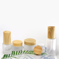 Empty Refillable Frosted Glass Cosmetic Cream Lotion Pump Bottles With Wood Grain Lid for Emulsion Essence Liquid