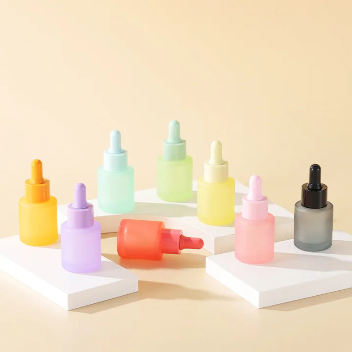 Wholesale Serum Cosmetic Packaging 20ml Frosted pink Blue Red Black Flat Essential Oil Glass Dropper Bottle