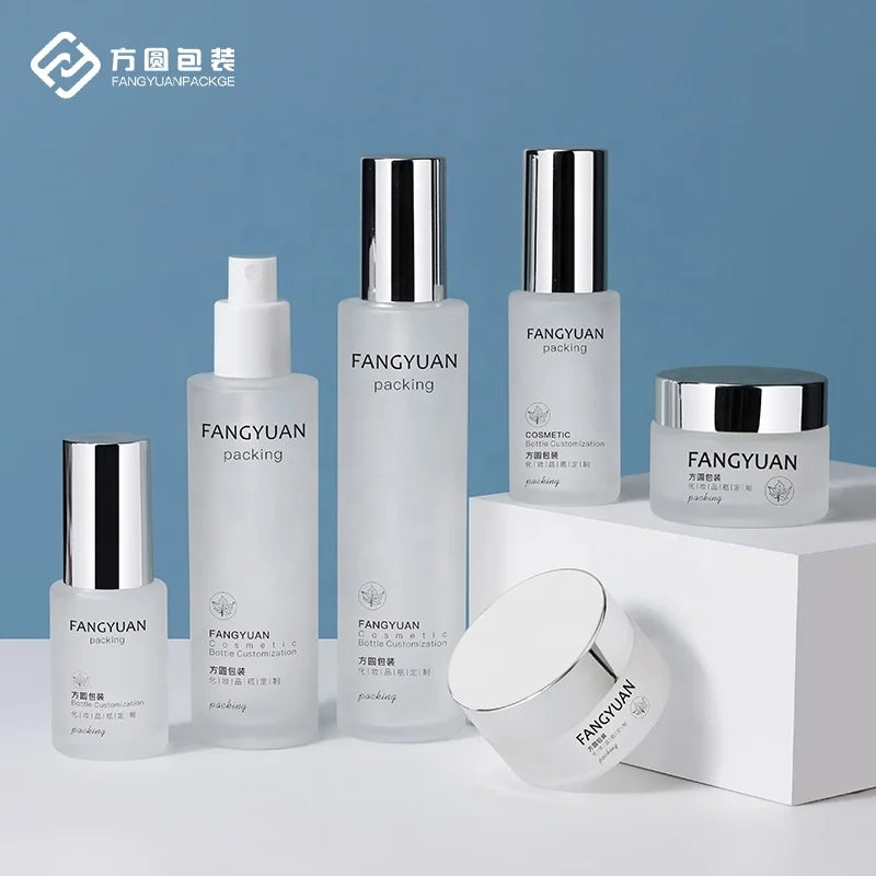China Factory Wholesale Silver Cap Frosted Cosmetic Glass Bottle Packaging Jars and Bottle Supplier