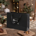 Custom Luxury White Kraft Paper Packaging Black Gift Bags with Silver Foil Logo and Ribbon Handles Comfortable Cotton Handle