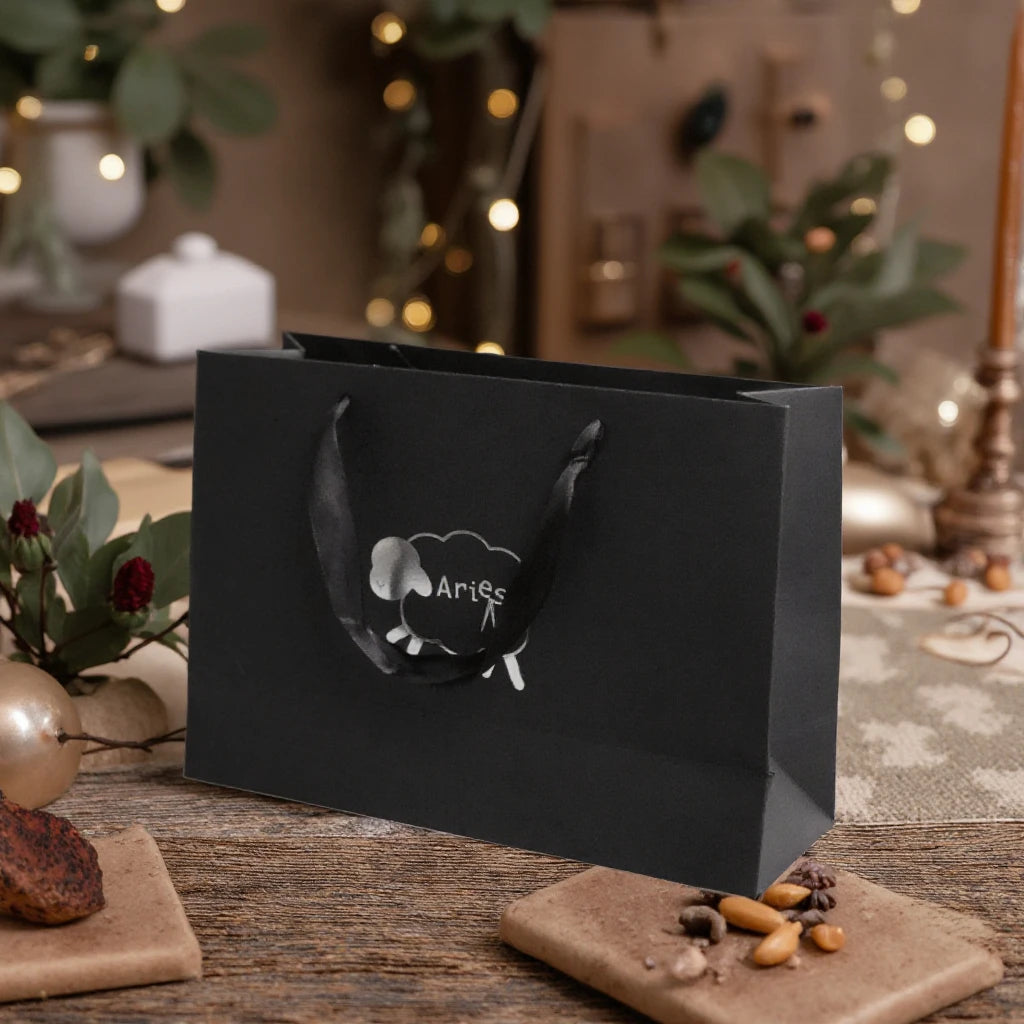 Custom Luxury White Kraft Paper Packaging Black Gift Bags with Silver Foil Logo and Ribbon Handles Comfortable Cotton Handle