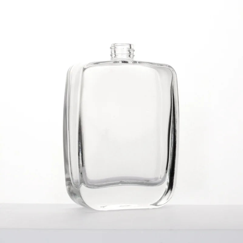 Wholesale Manufacturer Cheap Parfum Bottle Packaging 50ml Empty Clear Round Glass Spray Perfume Bottle With Black Magnetic Cap