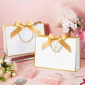 Elegant Luxury Paper Bag with Custom logo Ribbon Handle Perfect for Retail Gift Shops