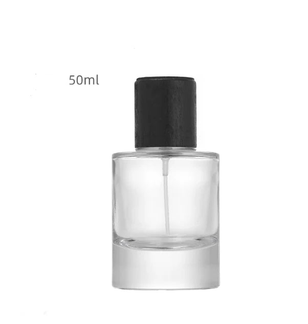 Wholesale Manufacturer Skin Care Packaging 50ml 30ml Empty Clear Round Glass Spray Perfume Bottle With Black Magnetic Cap