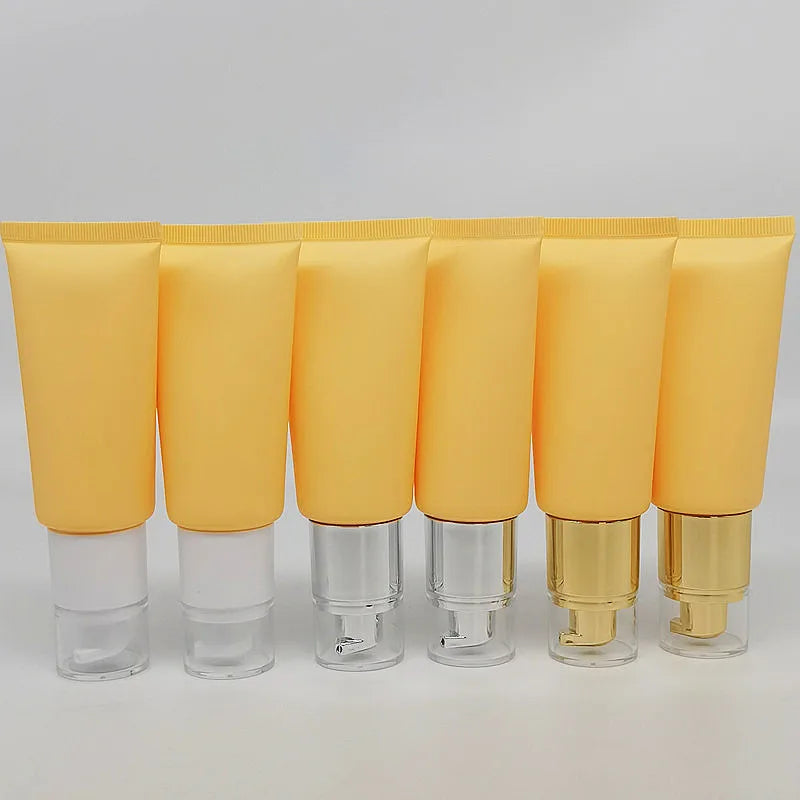 Stock 50g Frosted Yellow Plastic Lotion Packaging Container Vacuum Cosmetic Hose for Face Wash Lotion Airless Lotion Tube