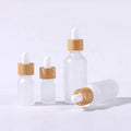 Personal Care Package Frosted Glass Dropper Bottle 5ml 10ml 20ml 30ml 50ml 100ml Sizes Bamboo Dropper for Empty Essential Oils