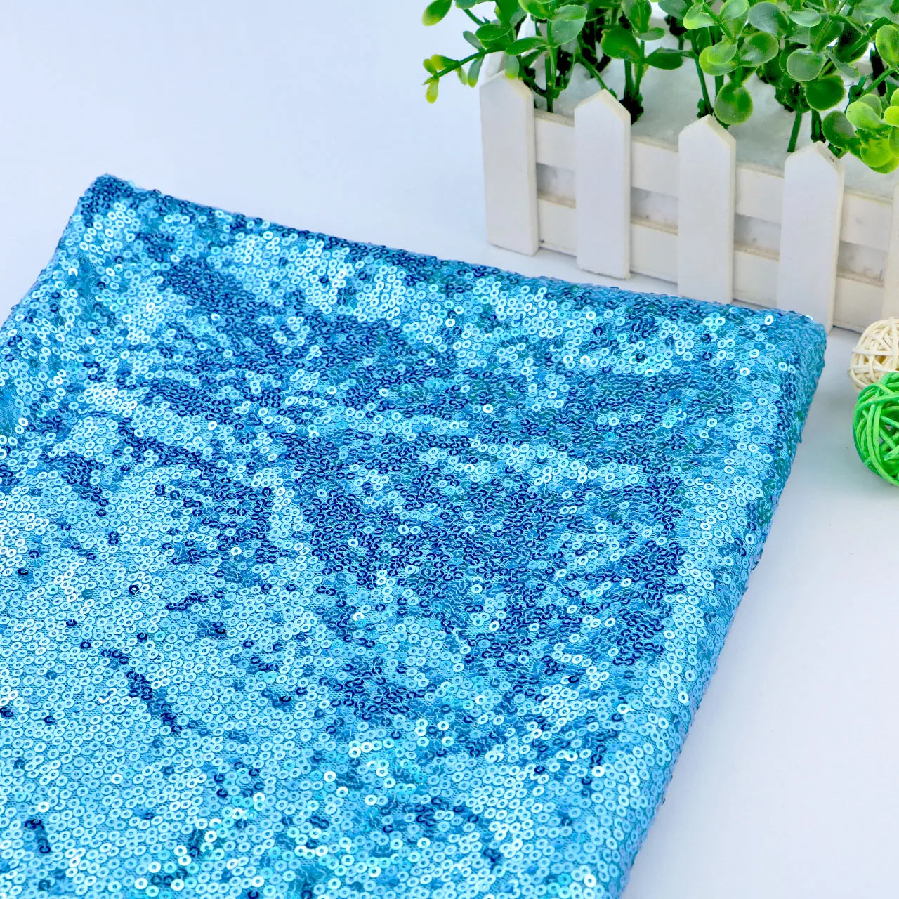 Nanyee Textile Glitz Sparkly Light Blue 3mm Sequin Fabric on Poly Mesh for Tablecloth
