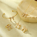 Trendy 4pcs /Set Women Pearl Inlay Stainless Steel Bowknot Necklace Earrings Bangle Ring Kit Pearl Party Gift