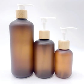 Bamboo Cosmetic Package Set 150ml 250ml Cream Jar 120ml 250ml 500ml Amber Frosted PET Plastic Shampoo Bottle with Bamboo Pump